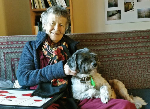 A portrait of Dinah with her faithful Tibetan terrier. Both look very content.
