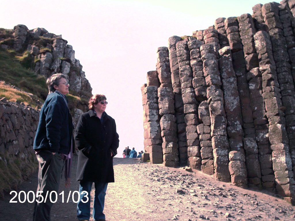 In this picture, Dinah and Wenn are shown contemplating the towering, stony barrier before them.